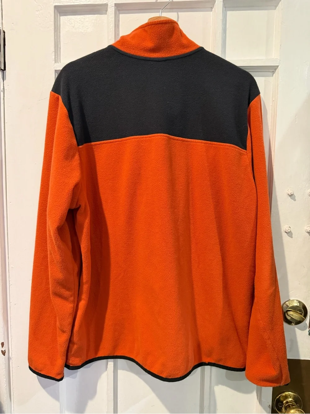 The North Face Men’s Orange and Black Zip-Neck Fleece